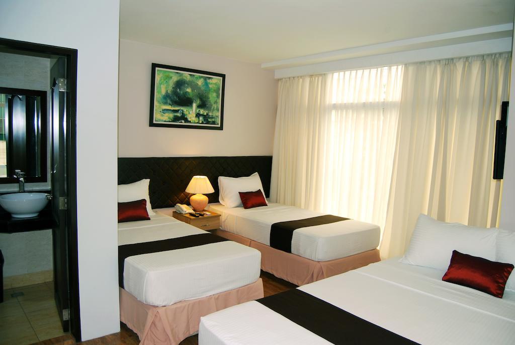 Capitol Central Hotel And Suites Cebu Room photo